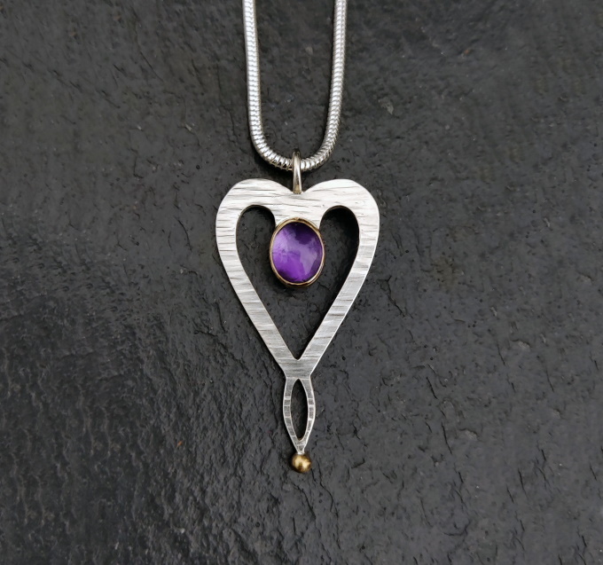 'Heart of Gold Sterling Silver Pendant' by artist Marley McKinnie